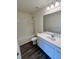 Bright bathroom featuring a modern vanity, stylish mirror and shower-tub combination at 707 Pisces Ln, Summerville, SC 29486