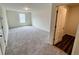 An empty bonus room featuring plush carpeting at 707 Pisces Ln, Summerville, SC 29486