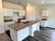 Kitchen with granite countertops and luxury vinyl plank flooring at 707 Pisces Ln, Summerville, SC 29486