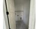 A dedicated laundry space ready for customization, featuring connections and ample room at 717 Blueway Ave, Summerville, SC 29486
