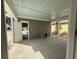 Covered porch features a painted ceiling, gray siding, and white trim details at 717 Blueway Ave, Summerville, SC 29486