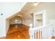 Finished attic space with wood floor, beadboard ceiling, and a small closet at 755 Jumbo Ln, Edisto Island, SC 29438
