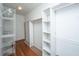 Walk-in closet with built-in shelving and hanging rods for optimal storage at 755 Jumbo Ln, Edisto Island, SC 29438