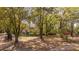 Beautifully maintained home surrounded by mature trees and lush landscaping, offering privacy and curb appeal at 755 Jumbo Ln, Edisto Island, SC 29438