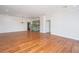 Bright open concept living room area with hardwood floors and view of the kitchen at 755 Jumbo Ln, Edisto Island, SC 29438