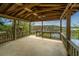Pavilion with a concrete slab foundation and view of the backyard marsh at 755 Jumbo Ln, Edisto Island, SC 29438