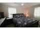 Comfortable bedroom featuring soft lighting and stylish decor, creating a peaceful retreat at 7605 Ireland Dr, North Charleston, SC 29420