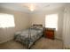 Cozy bedroom offers a serene ambiance, complemented by soft lighting and comfortable furniture at 7605 Ireland Dr, North Charleston, SC 29420
