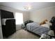 This comfortable bedroom features soft carpet, inviting natural light, and a relaxing atmosphere at 7605 Ireland Dr, North Charleston, SC 29420