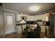 Inviting kitchen featuring stainless steel appliances, ample cabinet space, and a cozy dining area at 7605 Ireland Dr, North Charleston, SC 29420