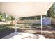 This backyard has a covered patio and a privacy fence surrounding the yard at 780 Corral Dr, Charleston, SC 29414
