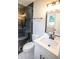 This bathroom has a glass shower, vanity with sink and large mirror at 780 Corral Dr, Charleston, SC 29414