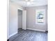 Cozy bedroom featuring a closet, ceiling fan, and natural light from a side window at 780 Corral Dr, Charleston, SC 29414