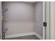 The laundry room features wood-look floors and utility connections at 780 Corral Dr, Charleston, SC 29414