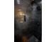 Modern shower featuring sleek, dark tile shower and a convenient built-in niche for storage at 780 Corral Dr, Charleston, SC 29414