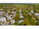 Sprawling neighborhood showcasing mature trees and diverse housing styles in a well-established community from above at 825 Marsh Grove Ave, Mount Pleasant, SC 29464