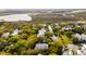 Scenic aerial view showcasing a beautiful neighborhood nestled amidst marshlands and lush greenery at 825 Marsh Grove Ave, Mount Pleasant, SC 29464