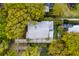 Detailed aerial view of a home with a metal roof, neat landscaping, and a cozy outdoor seating area at 825 Marsh Grove Ave, Mount Pleasant, SC 29464