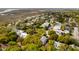 Stunning aerial view of a neighborhood with beautiful homes and lush landscaping by the water at 825 Marsh Grove Ave, Mount Pleasant, SC 29464