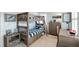 Cozy bedroom with bunk beds, a desk, and plenty of storage space at 825 Marsh Grove Ave, Mount Pleasant, SC 29464