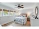 Bright bedroom with a comfortable bed, natural light, and neutral decor at 825 Marsh Grove Ave, Mount Pleasant, SC 29464