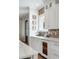 Elegant kitchen featuring custom cabinetry, a wine fridge, and stylish design elements at 825 Marsh Grove Ave, Mount Pleasant, SC 29464