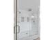 Luxurious walk-in shower with a glass door, double shower heads, and a built-in bench at 825 Marsh Grove Ave, Mount Pleasant, SC 29464
