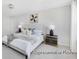 Cozy bedroom with modern night stands and carpet at 1008 Drakeford St # 4P, Saint George, SC 29477
