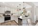 Modern kitchen featuring stainless steel appliances, granite countertops, a stylish island, and pendant lighting at 1008 Drakeford St # 4P, Saint George, SC 29477