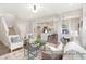 Inviting living room with modern decor, open layout, and seamless flow to the kitchen at 1008 Drakeford St # 4P, Saint George, SC 29477