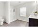 Bathroom featuring glass shower, double sink vanity, tiled floor, and natural lighting at 1017 Marsh Harrier Dr # Cc3-3-3, Ravenel, SC 29470