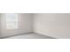 Bright bedroom with a window and neutral walls, ready for personalization and decor at 1017 Marsh Harrier Dr # Cc3-3-3, Ravenel, SC 29470