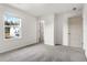 Bedroom with neutral paint, carpet, natural light, and closet at 1017 Marsh Harrier Dr # Cc3-3-3, Ravenel, SC 29470