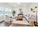 Inviting living room with ample seating, natural light, and stylish furnishings at 1017 Marsh Harrier Dr # Cc3-3-3, Ravenel, SC 29470