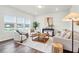 Cozy living room with a serene view, comfortable seating, and a neutral color palette at 1017 Marsh Harrier Dr # Cc3-3-3, Ravenel, SC 29470