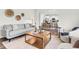 Stylish living room with an open floor plan to the kitchen and dining area, perfect for entertaining at 1017 Marsh Harrier Dr # Cc3-3-3, Ravenel, SC 29470