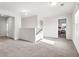 Loft area with carpeted floor, natural lighting, and access to the bedrooms at 1017 Marsh Harrier Dr # Cc3-3-3, Ravenel, SC 29470