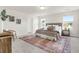 Main bedroom features natural lighting, neutral color palette, ceiling fan, and decorative rug at 1017 Marsh Harrier Dr # Cc3-3-3, Ravenel, SC 29470