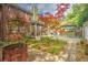 Private brick backyard featuring a screened in porch and a gazebo with cooking area at 1026 Stono River Dr, Charleston, SC 29412