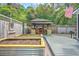 Backyard featuring a gazebo with grilling area, raised garden beds, and flag at 1026 Stono River Dr, Charleston, SC 29412