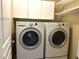 Laundry room featuring a washer and dryer and shelving at 1026 Stono River Dr, Charleston, SC 29412