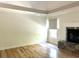 Living room showcasing hardwood floors, neutral paint, fireplace, and lots of natural light at 1026 Stono River Dr, Charleston, SC 29412