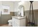 Bathroom features a vanity with granite countertop and brushed-nickel faucet at 106 Ruffin Rd, Summerville, SC 29486