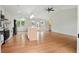 Bright and airy kitchen featuring white cabinets, stainless appliances, a kitchen island, and a view to the backyard at 106 Ruffin Rd, Summerville, SC 29486
