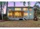 Enjoy a spacious screened porch and fire pit in this beautiful home at 1185 Out Of Bounds Dr, Summerville, SC 29485
