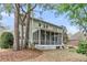 Charming home with screened porch and fire pit in beautifully landscaped backyard at 1185 Out Of Bounds Dr, Summerville, SC 29485