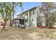 Lovely screened porch and outdoor fire pit provide comfortable backyard living at 1185 Out Of Bounds Dr, Summerville, SC 29485
