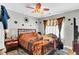 Comfortable bedroom with a decorative ceiling fan and warm accents creating a relaxing retreat at 1185 Out Of Bounds Dr, Summerville, SC 29485