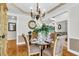 Charming dining room with a round table, chandelier, and neutral color palette at 1185 Out Of Bounds Dr, Summerville, SC 29485
