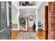 Grand foyer with hardwood floors, elegant staircase, and decorative accents at 1185 Out Of Bounds Dr, Summerville, SC 29485